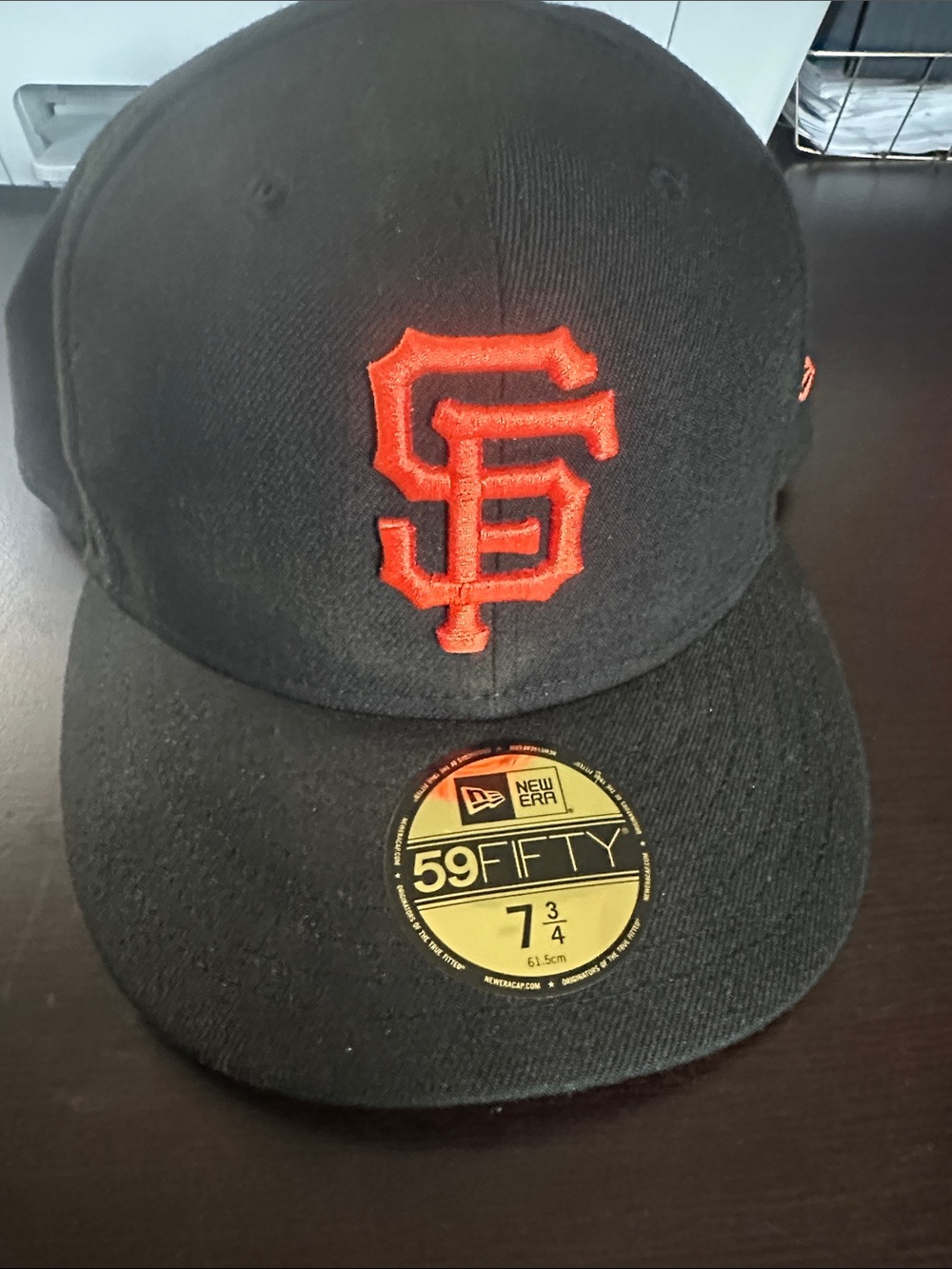 New Era Black Cap with Orange Embroidered Logo - Men’s